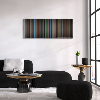 Insomnia color palette canvas above a black sofa with a gold-topped table
