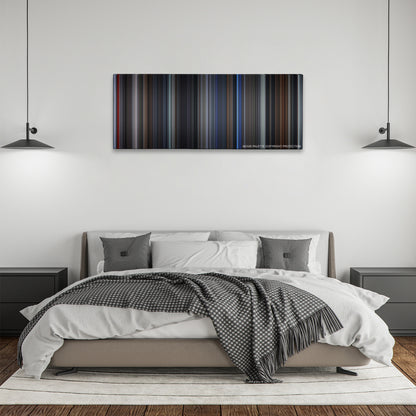 The Grudge color palette canvas above a bed, between two black pendant lamps
