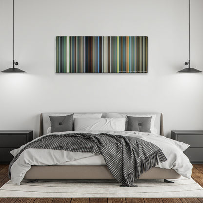 Snowden color palette canvas above a bed, between two black pendant lamps