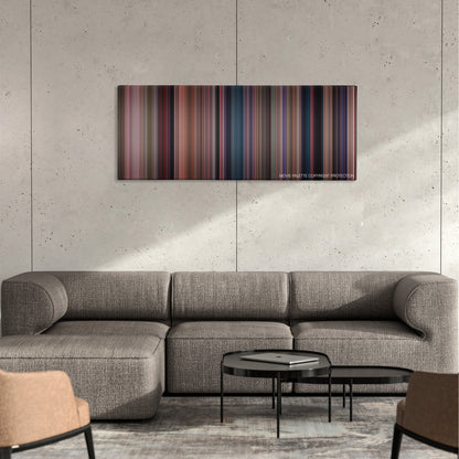 Heathers color palette canvas on a concrete wall above a gray sectional sofa