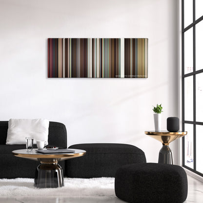 Something Borrowed color palette canvas above a black sofa with a gold-topped table