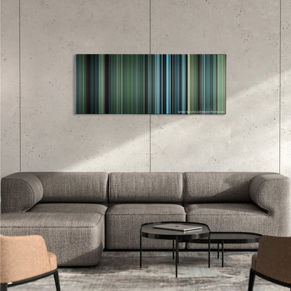 Defiance color palette canvas on a concrete wall above a gray sectional sofa