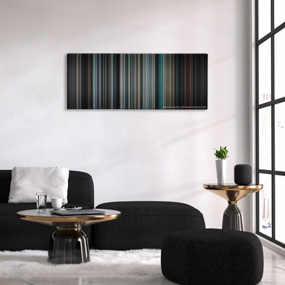 Insidious color palette canvas above a black sofa with a gold-topped table