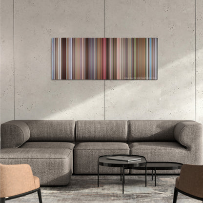 Starsky & Hutch color palette canvas on a concrete wall above a gray sectional sofa