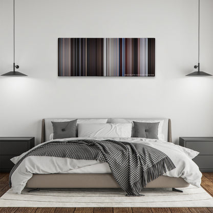 Conan the Barbarian color palette canvas above a bed, between two black pendant lamps