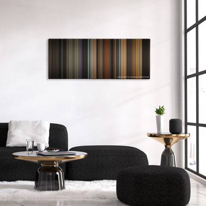 Rent color palette canvas above a black sofa with a gold-topped table