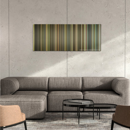 Ray color palette canvas on a concrete wall above a gray sectional sofa