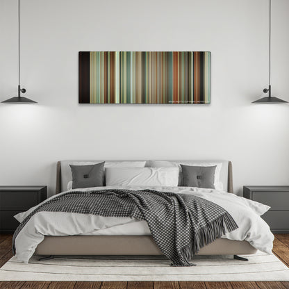 A Serious Man color palette canvas above a bed, between two black pendant lamps