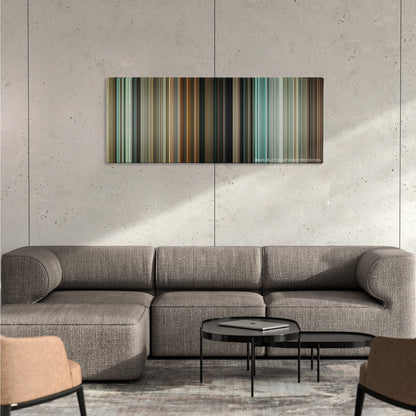 The Skin I Live In color palette canvas on a concrete wall above a gray sectional sofa