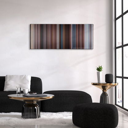 The Mist color palette canvas above a black sofa with a gold-topped table
