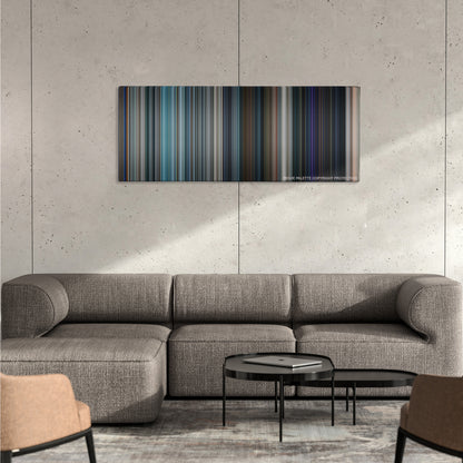 Jack Reacher: Never Go Back color palette canvas on a concrete wall above a gray sectional sofa