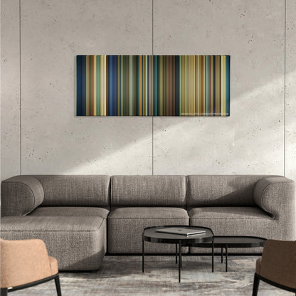 One Day color palette canvas on a concrete wall above a gray sectional sofa