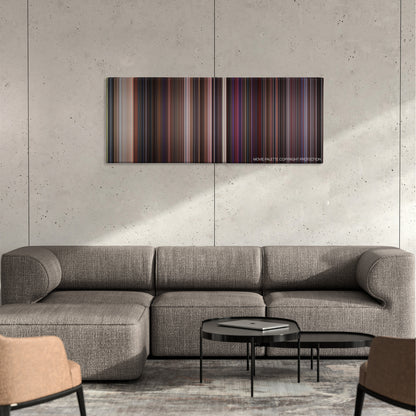 Super Mario Bros. color palette canvas on a concrete wall above a gray sectional sofa