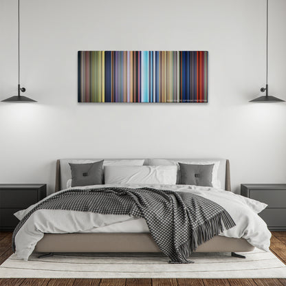 Bambi color palette canvas above a bed, between two black pendant lamps