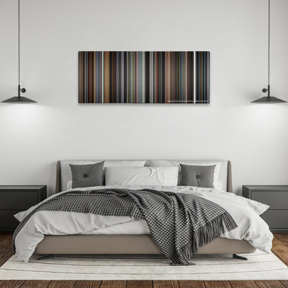 Lost Highway color palette canvas above a bed, between two black pendant lamps