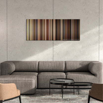 Bewitched color palette canvas on a concrete wall above a gray sectional sofa