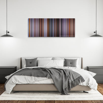 While You Were Sleeping color palette canvas above a bed, between two black pendant lamps