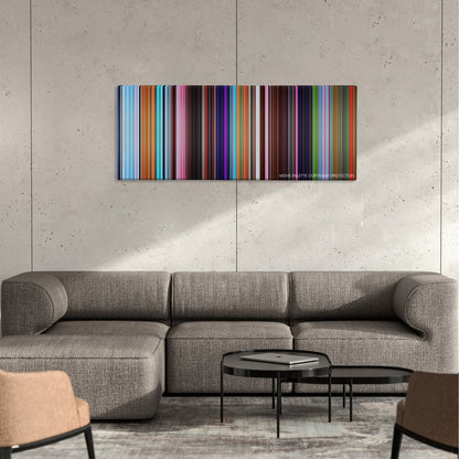 The Peanuts Movie color palette canvas on a concrete wall above a gray sectional sofa
