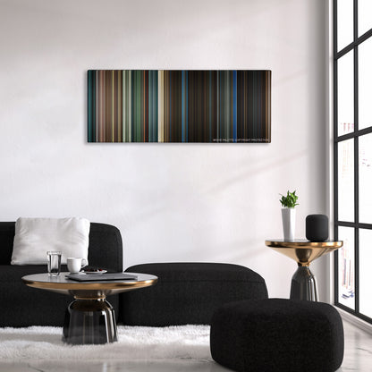 Jurassic World: Fallen Kingdom color palette canvas above a black sofa with a gold-topped table