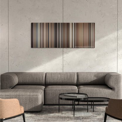 Kramer vs. Kramer color palette canvas on a concrete wall above a gray sectional sofa
