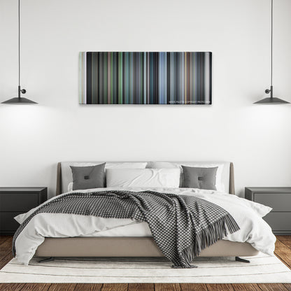 Come and See color palette canvas above a bed, between two black pendant lamps