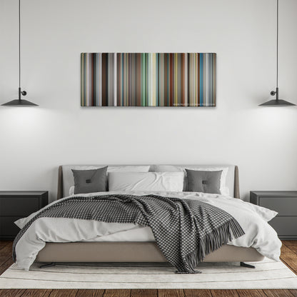 The Other Woman color palette canvas above a bed, between two black pendant lamps