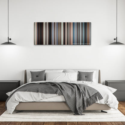 The Last Song color palette canvas above a bed, between two black pendant lamps