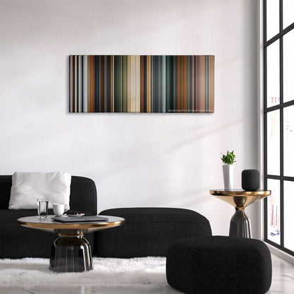 Clash of the Titans color palette canvas above a black sofa with a gold-topped table