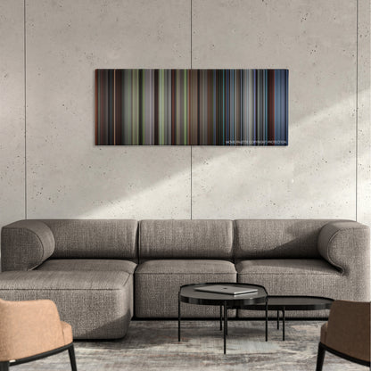 Excalibur color palette canvas on a concrete wall above a gray sectional sofa