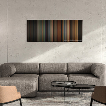 Rent color palette canvas on a concrete wall above a gray sectional sofa