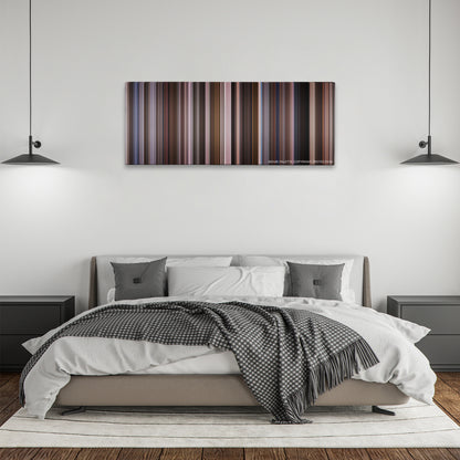 An Education color palette canvas above a bed, between two black pendant lamps