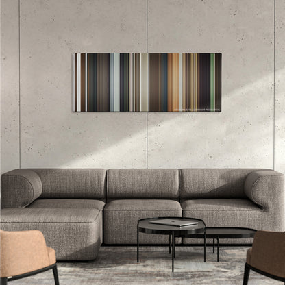 Killing Them Softly color palette canvas on a concrete wall above a gray sectional sofa