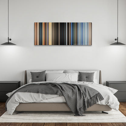The Old Guard color palette canvas above a bed, between two black pendant lamps