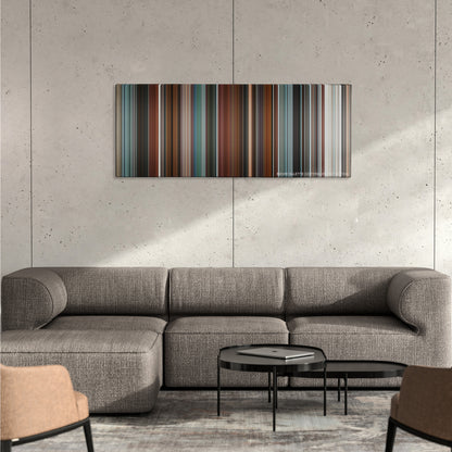Four Brothers color palette canvas on a concrete wall above a gray sectional sofa
