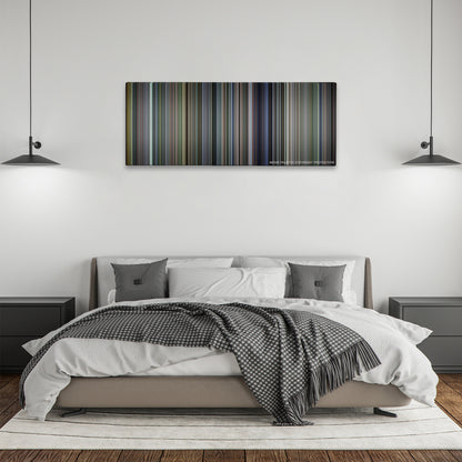 Billy Elliot color palette canvas above a bed, between two black pendant lamps