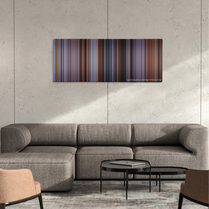 While You Were Sleeping color palette canvas on a concrete wall above a gray sectional sofa