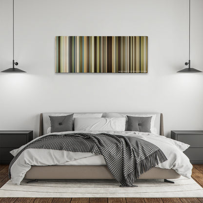 The Founder color palette canvas above a bed, between two black pendant lamps