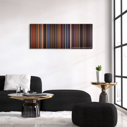 Rock of Ages color palette canvas above a black sofa with a gold-topped table