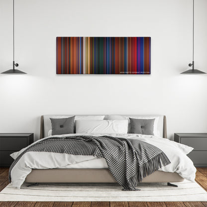 Peter Pan color palette canvas above a bed, between two black pendant lamps