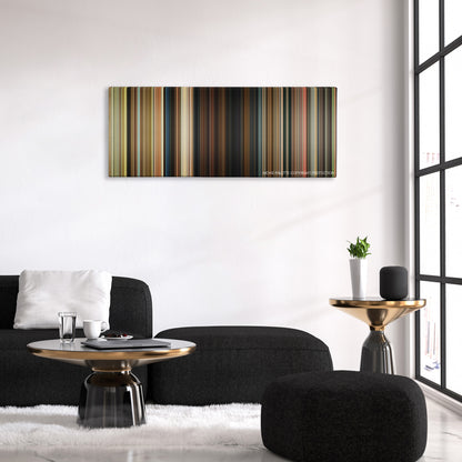 Odd Thomas color palette canvas above a black sofa with a gold-topped table
