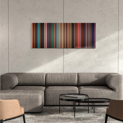 Spring Breakers color palette canvas on a concrete wall above a gray sectional sofa