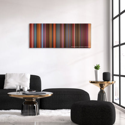 Cats color palette canvas above a black sofa with a gold-topped table