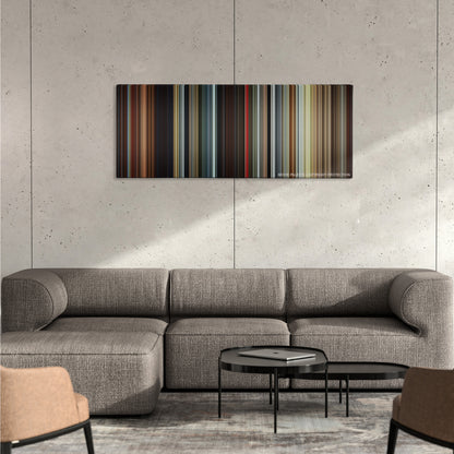 Jack the Giant Slayer color palette canvas on a concrete wall above a gray sectional sofa