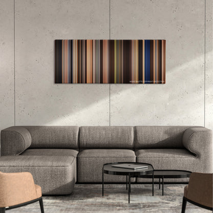 The Ghost and the Darkness color palette canvas on a concrete wall above a gray sectional sofa
