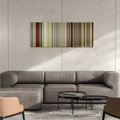 Logan Lucky color palette canvas on a concrete wall above a gray sectional sofa