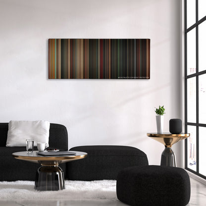 Angels & Demons color palette canvas above a black sofa with a gold-topped table