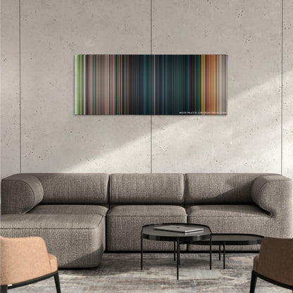 Snakes on a Plane color palette canvas on a concrete wall above a gray sectional sofa
