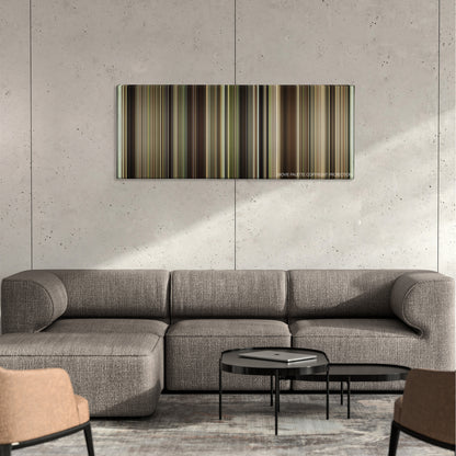 Chariots of Fire color palette canvas on a concrete wall above a gray sectional sofa