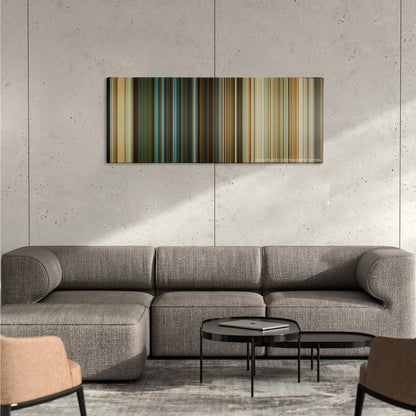 The Last Stand color palette canvas on a concrete wall above a gray sectional sofa
