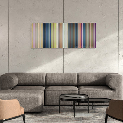 The Aristocats color palette canvas on a concrete wall above a gray sectional sofa